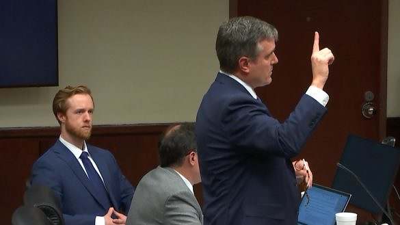 Attorney Andrew Moorman with Zachary Hughes