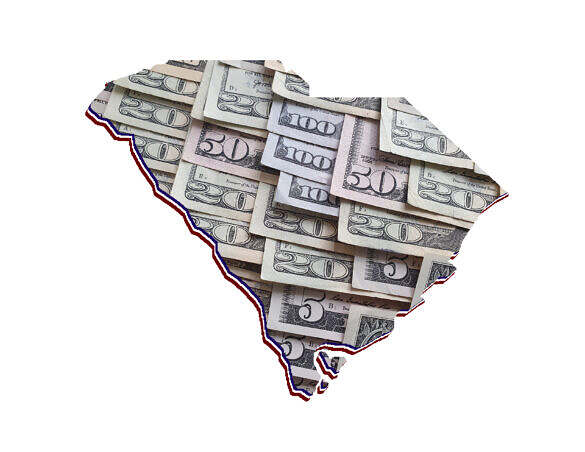 American dollar banknotes forming the map of South Carolina State and white background