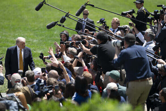 President Donald J. Trump speaks to the press before boarding Marine One on the South Lawn of the White House, Tuesday, May 12, 2026, en route to Joint Base Andrews for a trip to Beijing, China. (Official White House Photo by Joyce N. Boghosian)