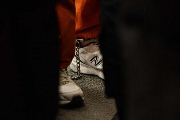Alex Murdaugh wears shackles around his ankles as he’s brought into the courtroom for a status conference to discuss an upcoming hearing on jury-tampering allegations against Colleton County Clerk of Court Rebecca “Becky” Hill to be ruled by former S.C. Chief Justice Jean Toal at the Richland County Judicial Center on Monday, Jan. 16, 2024, in Columbia, S.C. Gavin McIntyre/The Post and Courier/Pool