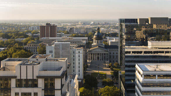 Modern architecture meets historical district on Main Street in Columbia, SC. South Carolina State House, located in the center of Downtown