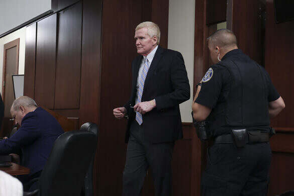 Alex Murdaugh, dressed in street clothing, enters the courtroom on Friday, Aug. 14, 2026 at a status hearing at the Marc H. Westbrook Judicial Center in Lexington, South Carolina. Alex Murdaugh will be retried in the June 7, 2021, shooting deaths of his wife and son, after his original conviction was overturned due to jury tampering.