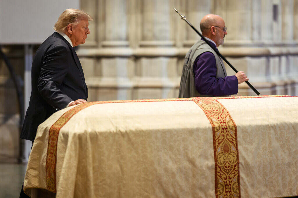 U.S. president Donald Trump pays his respects to the late Lindsey Graham.